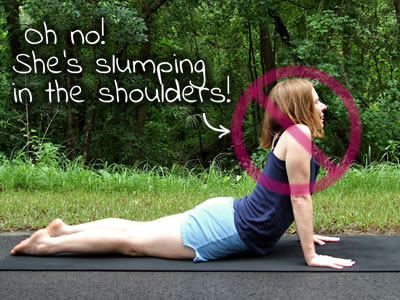Author Faith messin&rsquo; up her cobra pose.